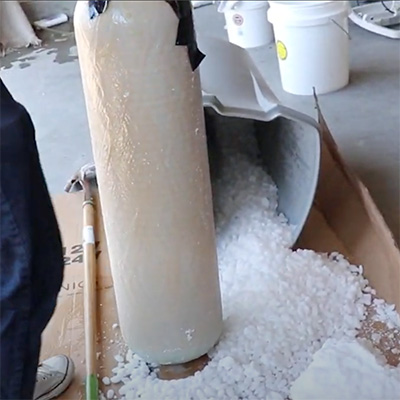 A Salt Bridge forms when a water softeners brine tank crystalizes and forms a solid block of salt.